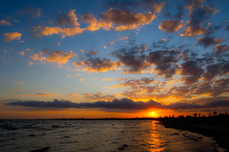 A stunning sunset at Rockport Beach, one of the top beaches on the Texas Gulf Coast.