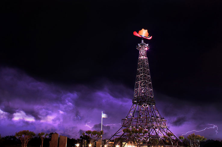 The Eiffel Tower in Paris, Texas, is a small-scale replica of the original adorned with a cowboy hat. 