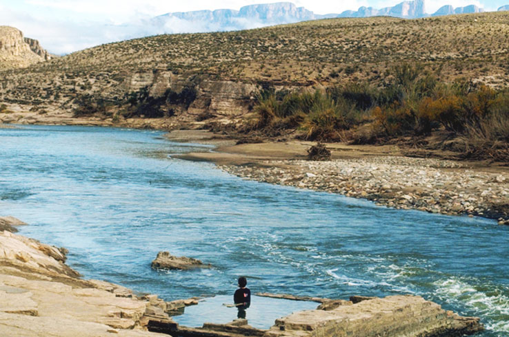 Relax in the Langford Hot Springs, which overlooks the Rio Grande River.