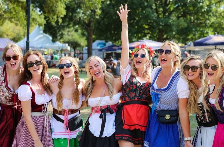 Young women celebrating Oktoberfest at Addison Circle Park