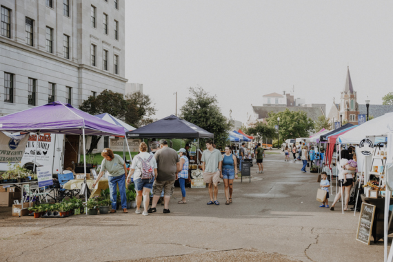 Vendors and shoppers at the Texarkana Farmers' Market outside the U.S. Post Office & Courthouse in downtown Texarkana